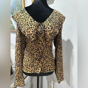 Animal print, Leopard print blouse. Used once ( runs big)